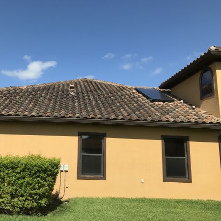 Soft Wash Roof Cleaning and Paver Wash on Levanto Drive in Viera